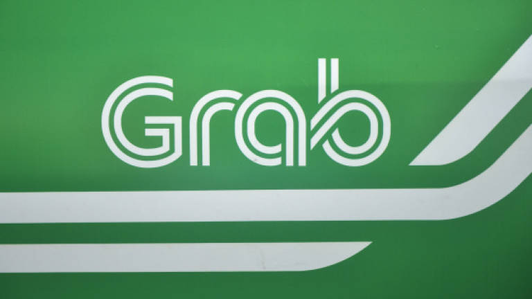 GrabCar expands to four more major cities