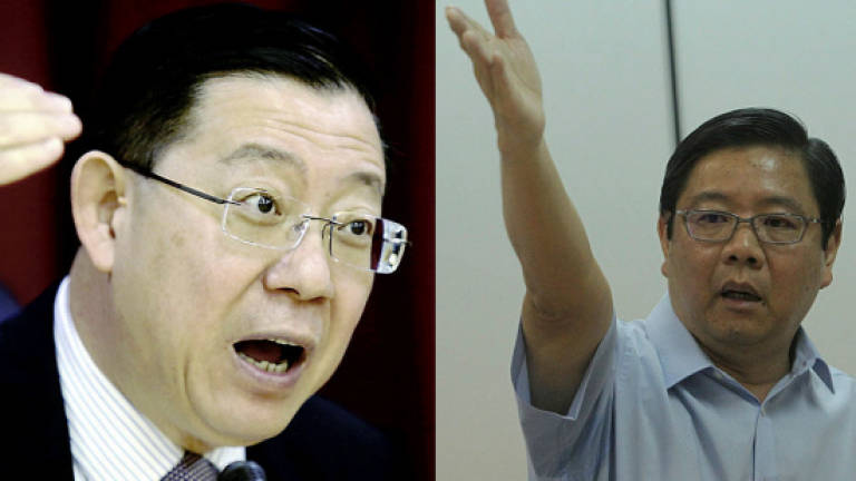 Guan Eng, Teng threaten to sue each other