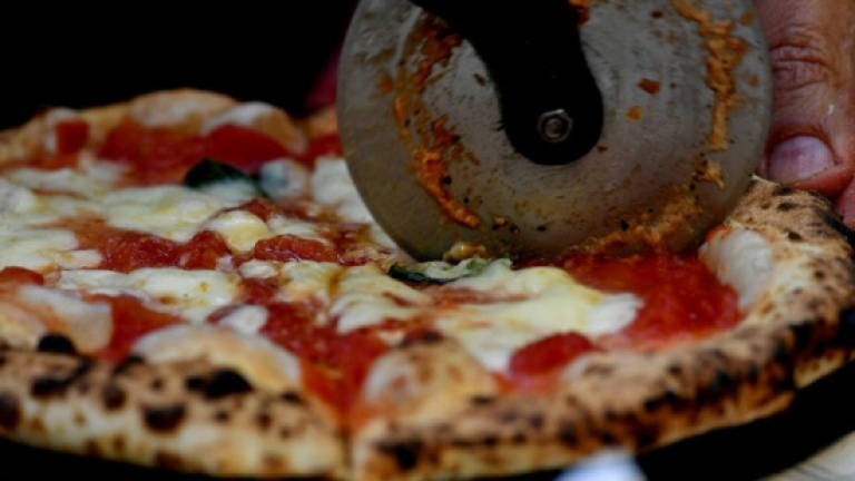 Slice of pizza paradise as Naples fetes UNESCO triumph