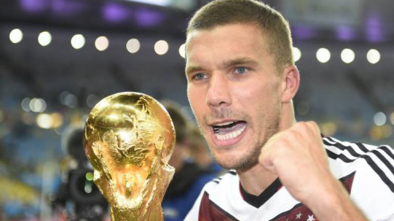 Germany's Podolski announces international retirement