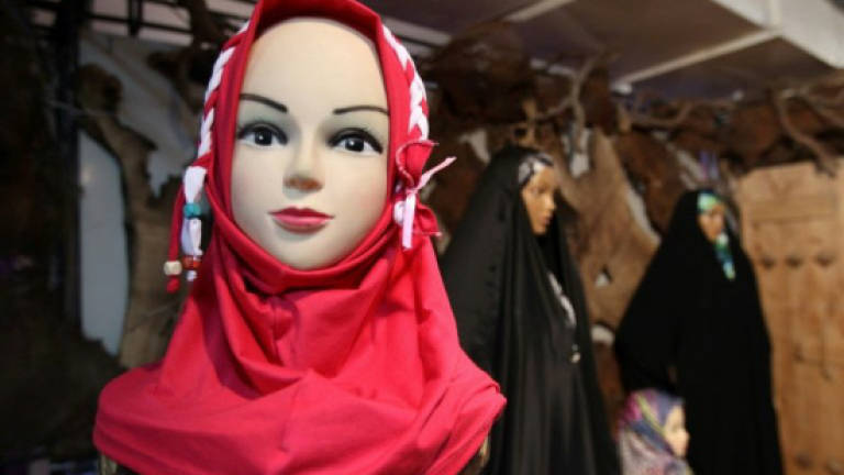 Iran headscarf protester sparks social media storm