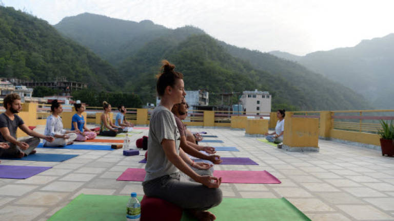 The world yoga capital, with a little help from its friends