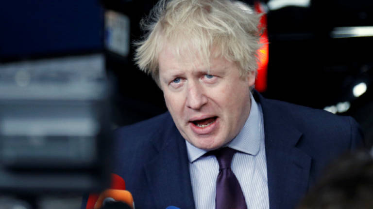 Russian poisoning denials 'increasingly absurd': UK's Johnson