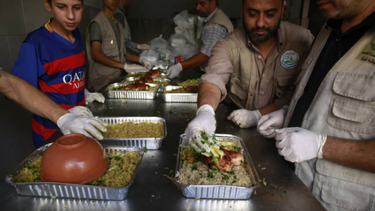 Ramadan soup kitchen offers brief respite to Gaza's hungry