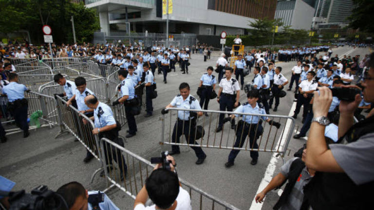 Tensions soar in Hong Kong as police bring in rubber bullets
