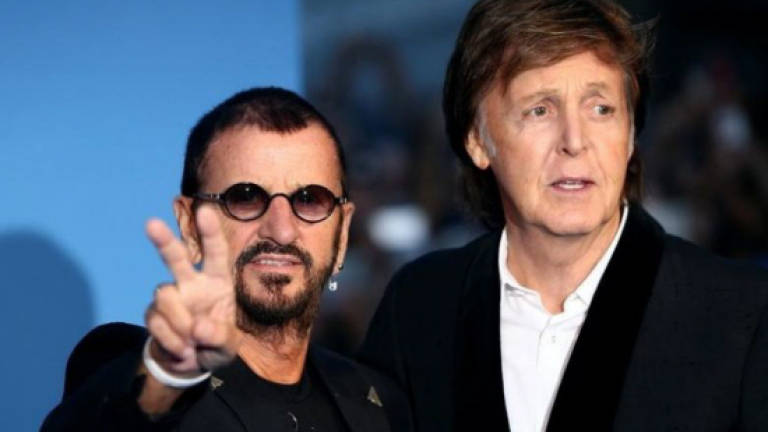 Paul McCartney 'emotional' as Beatles film has UK premiere