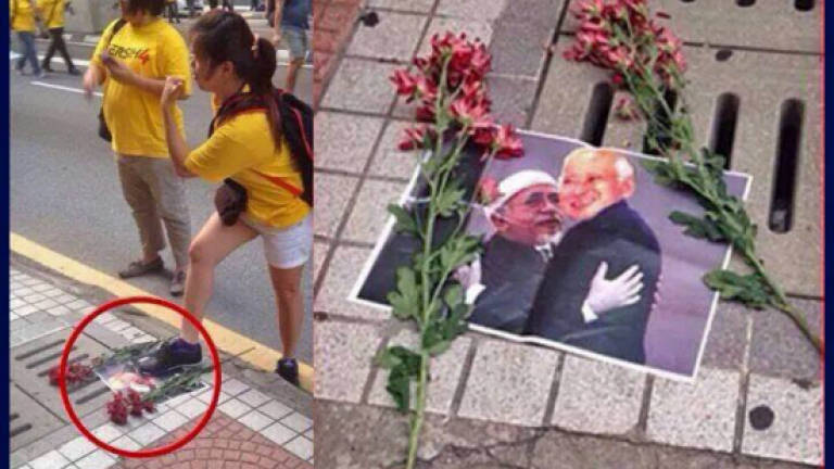 Police urge Bersih protesters who stepped on PM's poster to come forward
