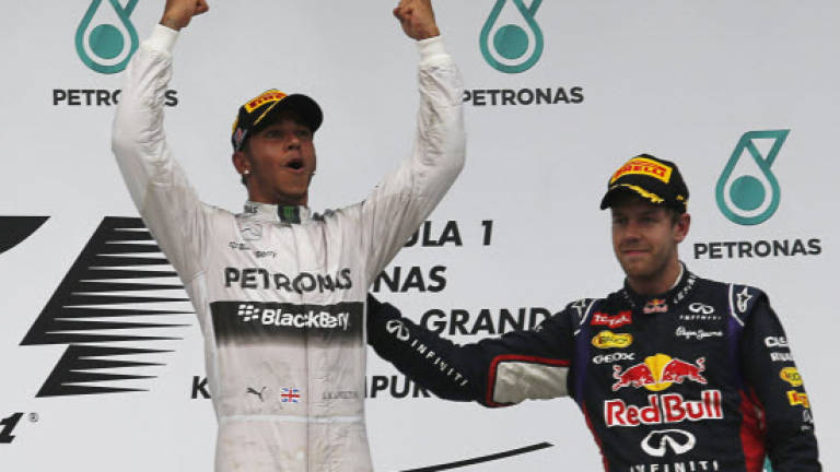 Pole-to-flag Hamilton wins in Malaysia