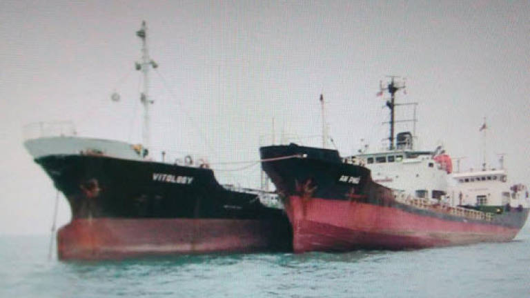 Two ships transferring fuel illegally detained