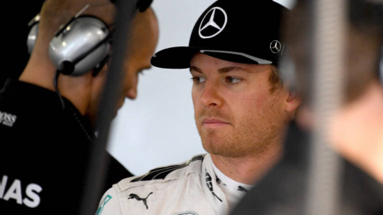 Rosberg looks to turn screw in Japan