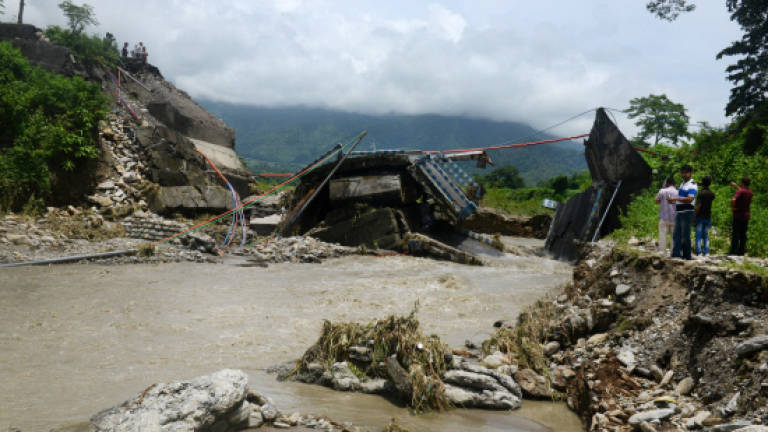 Landslides kill at least 21 in India's Darjeeling