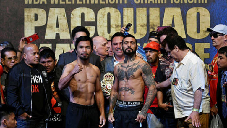 Pacquiao 'ready' to regain title after weigh-in with Matthysse
