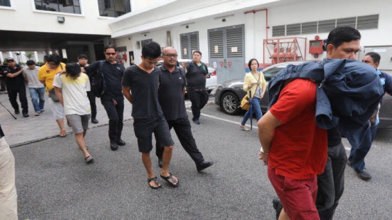 'Datuk' among five men charged with being members of organised crime gang 'Datuk' among five men charged with being members of organised crime gang