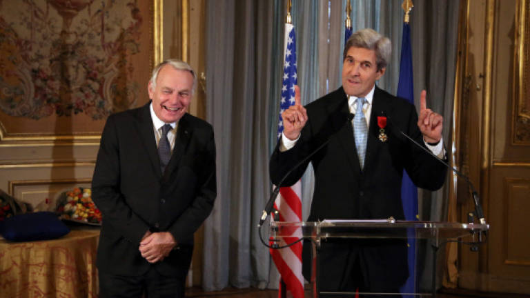 John Kerry given France's highest honour