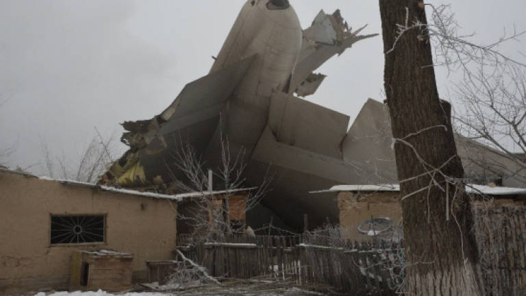Kyrgyzstan blames pilot error for Turkish cargo plane hitting village