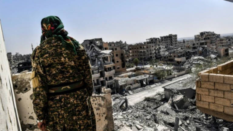 3,000 civilians flee Syria's Raqa under deal