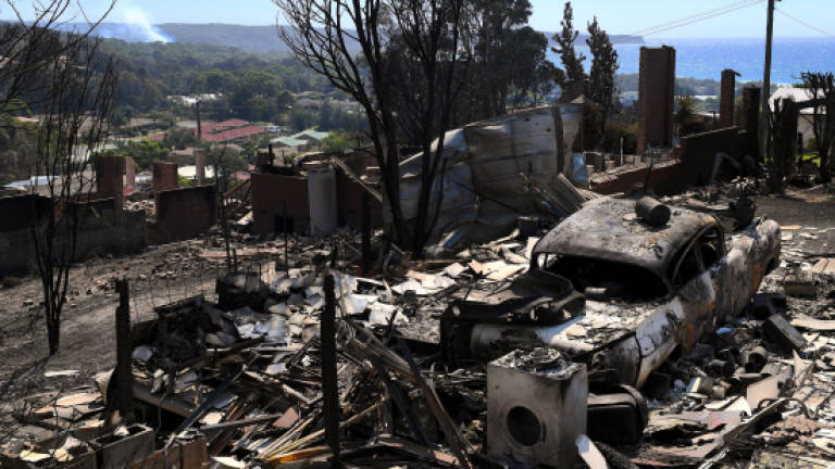 Residents get first look at town devastated by Australia bushfire