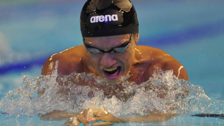 Debutant smashes 20-year record in men's 200m breaststroke