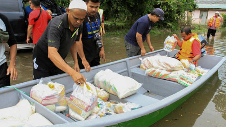 Kelantan flood victims rise to 8,392