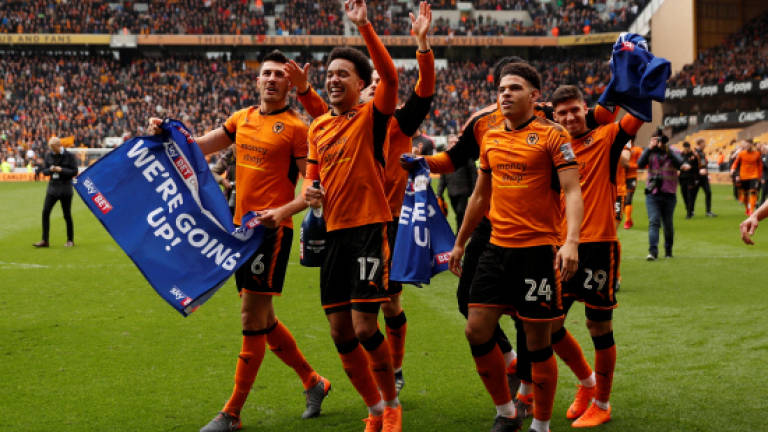 Wolves celebrate promotion to Premier League in style