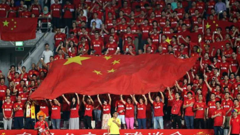 In China, disrespecting national anthem could mean three years in jail