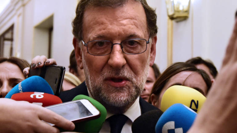 Spain crisis gives way to new battles for PM