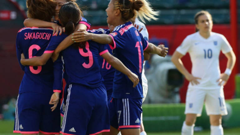 Dramatic Japan win books final rematch with USA