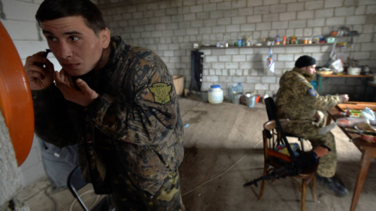 Ukraine resort town crumbles under frontline shells