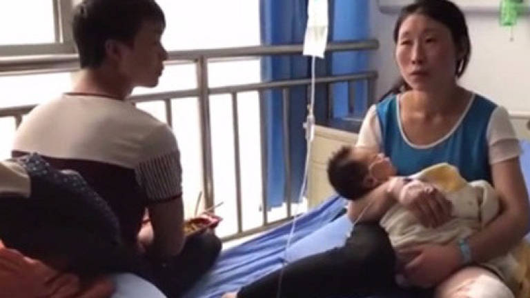 Wailing baby saves parents from being buried in landslide