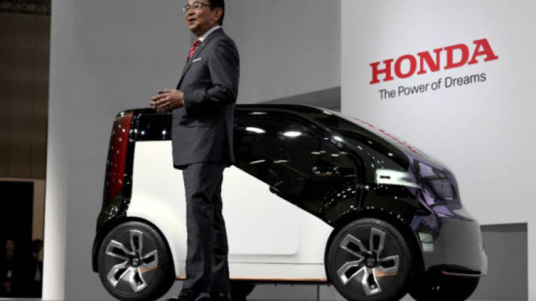 Scandal-hit Japan automakers eye return to 'golden age'