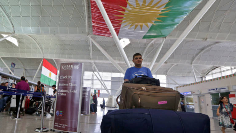 Foreigners leave Iraqi Kurdistan to avoid being 'stuck'