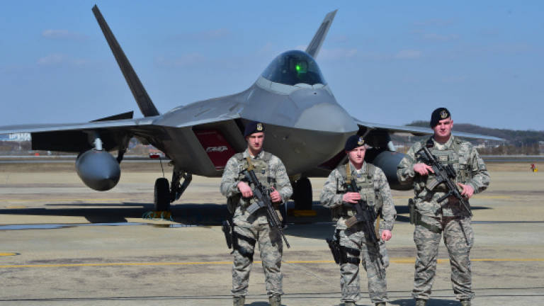 US F-22 stealth fighters fly over S. Korea in show of force