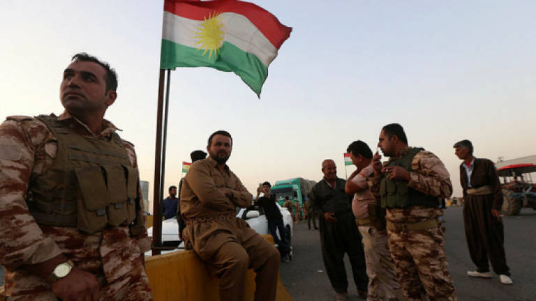 Iraqi forces seize Kirkuk governor's office in push against Kurds