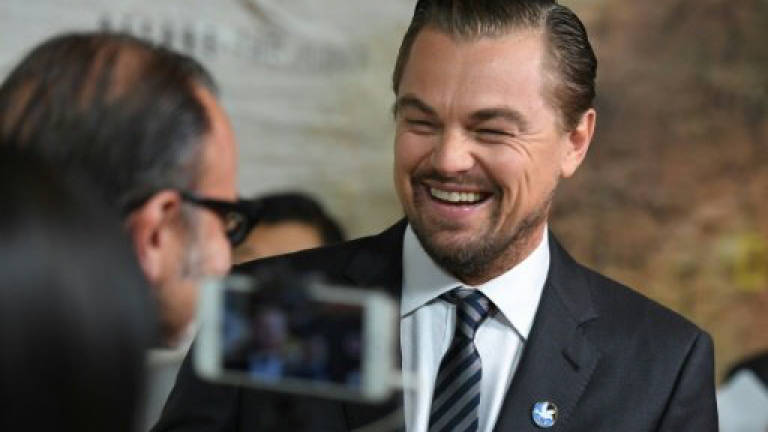 DiCaprio delights fans at Scottish homeless restaurant