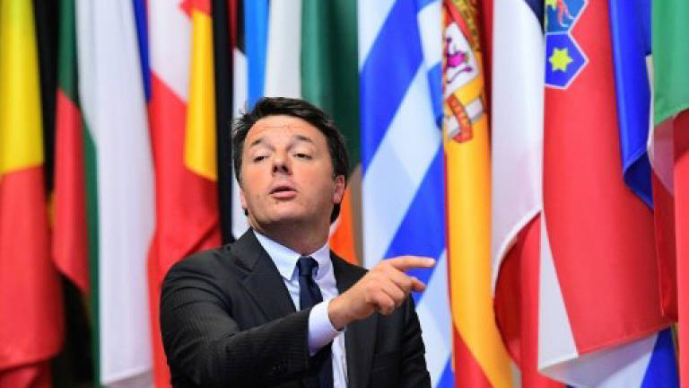 Italy PM threatens EU budget veto over migrants