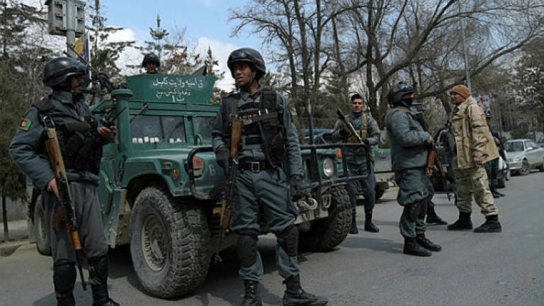Gunmen dressed as doctors attack Kabul military hospital