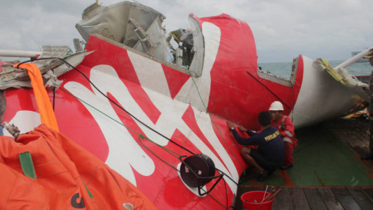 Divers find black box of crashed AirAsia jet, says Indonesia ministry