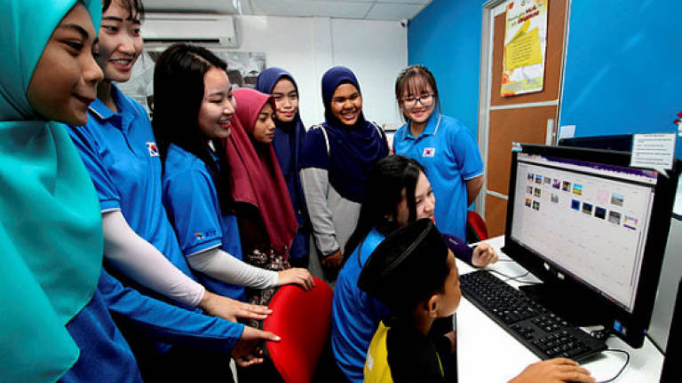 Bridging the digital divide with the help of Korean volunteers
