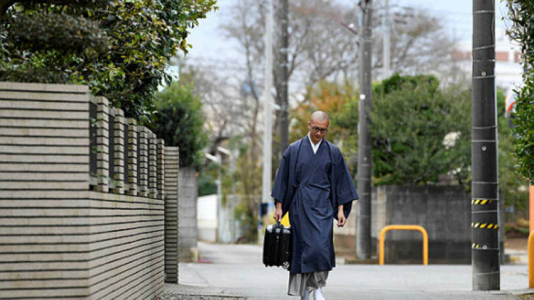 'Rent-a-monk' biz thrives as Japan loses temple ties