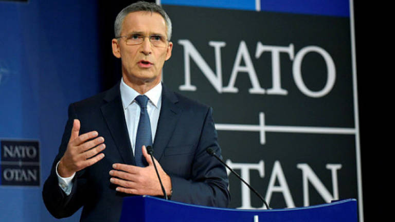 Stoltenberg reappointed as Nato chief until 2020
