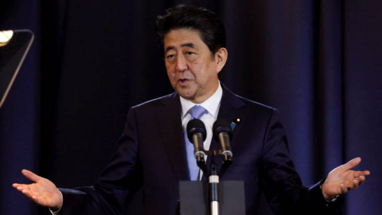 Japan PM says TPP trade pact meaningless without US