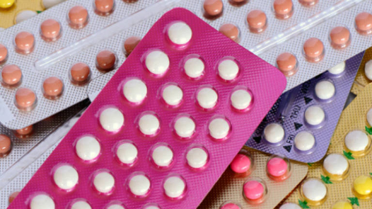 Taking the pill can protect women from certain cancers for up to 30 years