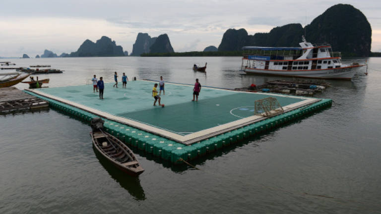 Floating football pitch keeps Thai tourist blues at bay