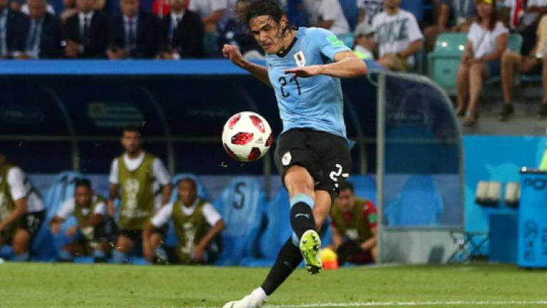 Cavani injury worry for Uruguay after two-goal heroics