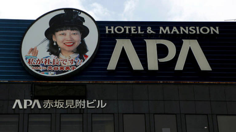Japan hotel chain could remove books denying Nanjing Massacre from some hotels