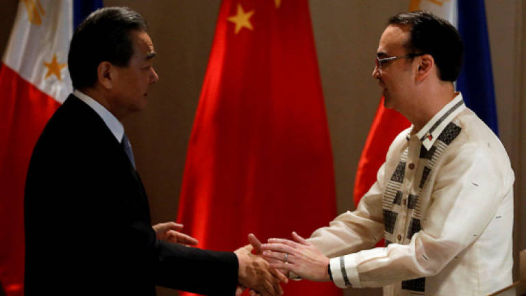 China backs joint energy development with Philippines in disputed sea