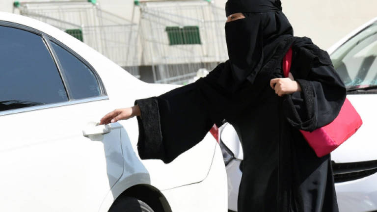 Saudi says to lift driving ban on women June 24