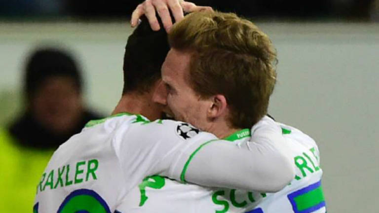 Schuerrle fires Wolfsburg into Champions League quarters