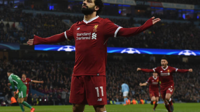 Guardiola sent off as Salah sends Liverpool into semi-finals