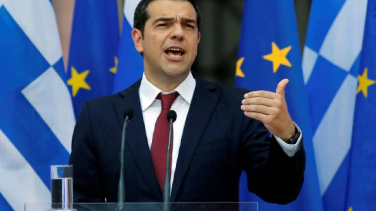 Greece hails 'historic' deal to end debt crisis